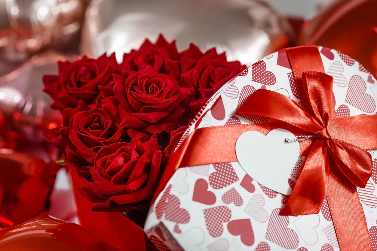 Valentine's Day holiday. A beautiful banner, a flyer for Valentine's day. Buying flowers for your beloved women. A concept for a flower shop.